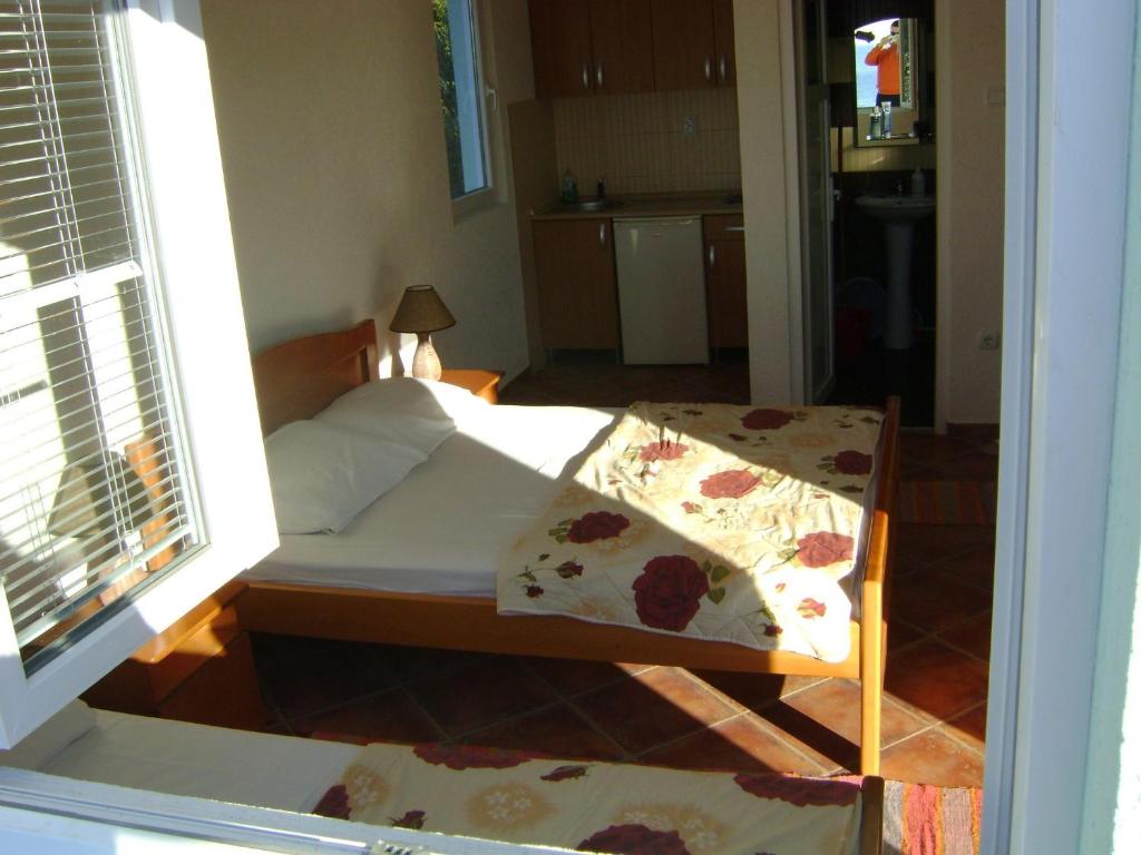 Postel nebo postele na pokoji v ubytování Arabela Apartments