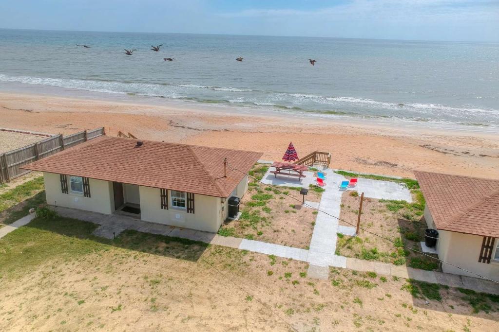 an aerial view of a house on the beach at Quarter Deck Cottage on Flagler Beach in Flagler Beach