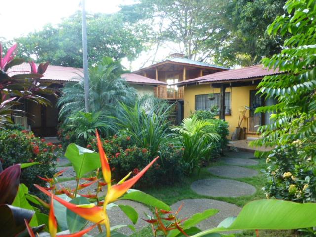 a house with a garden in front of it at Villa Silvestre in Coco