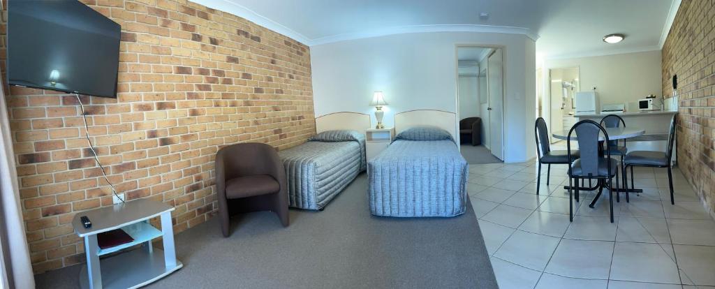 Kuchyň nebo kuchyňský kout v ubytování Crows Nest Motel