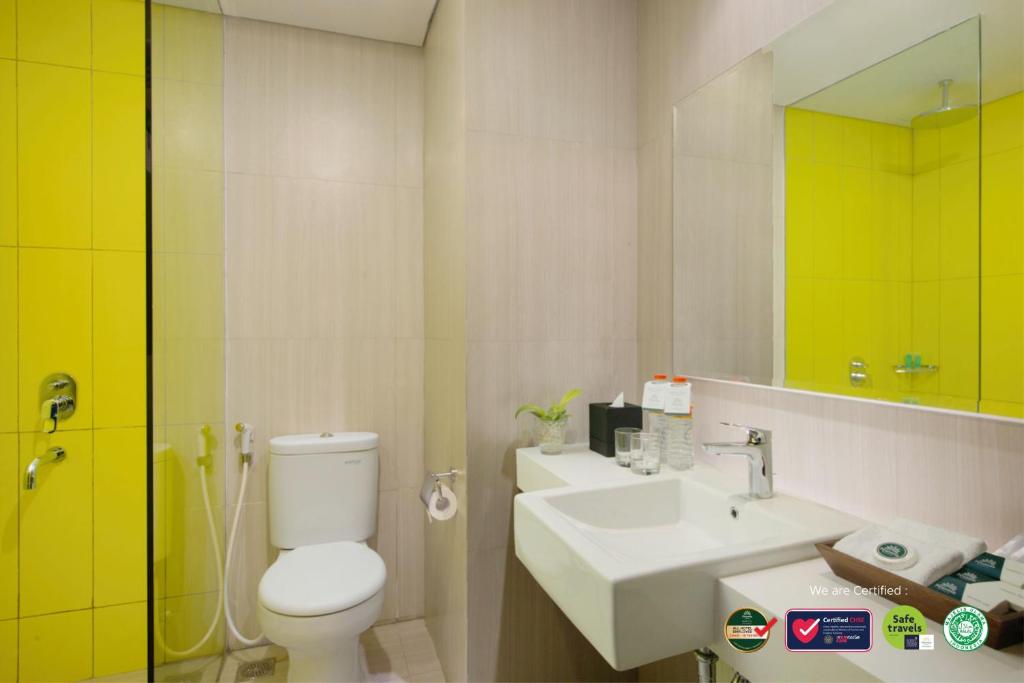 Koupelna v ubytování KHAS Malioboro Hotel