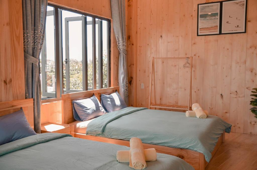 Voodi või voodid majutusasutuse Little Home Homestay toas