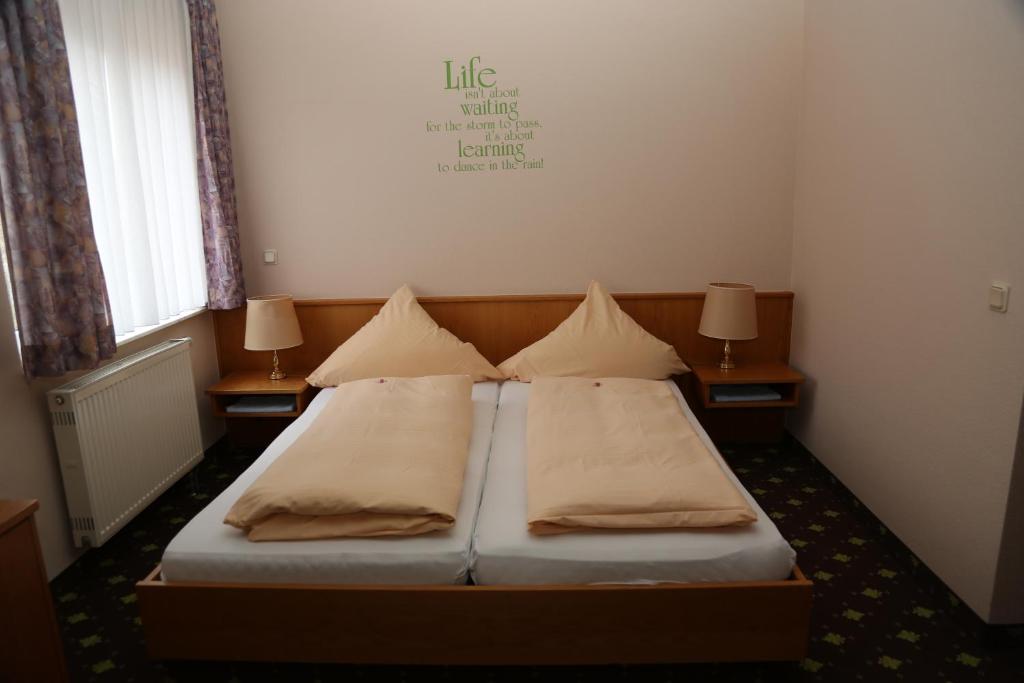 Postel nebo postele na pokoji v ubytování Hotel Taunus Residence