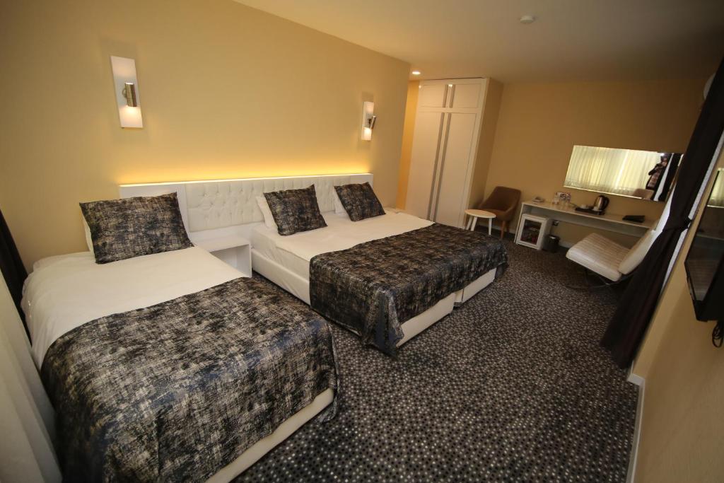 Grand Nora Hotel - Standaard Drievoudige Kamer
