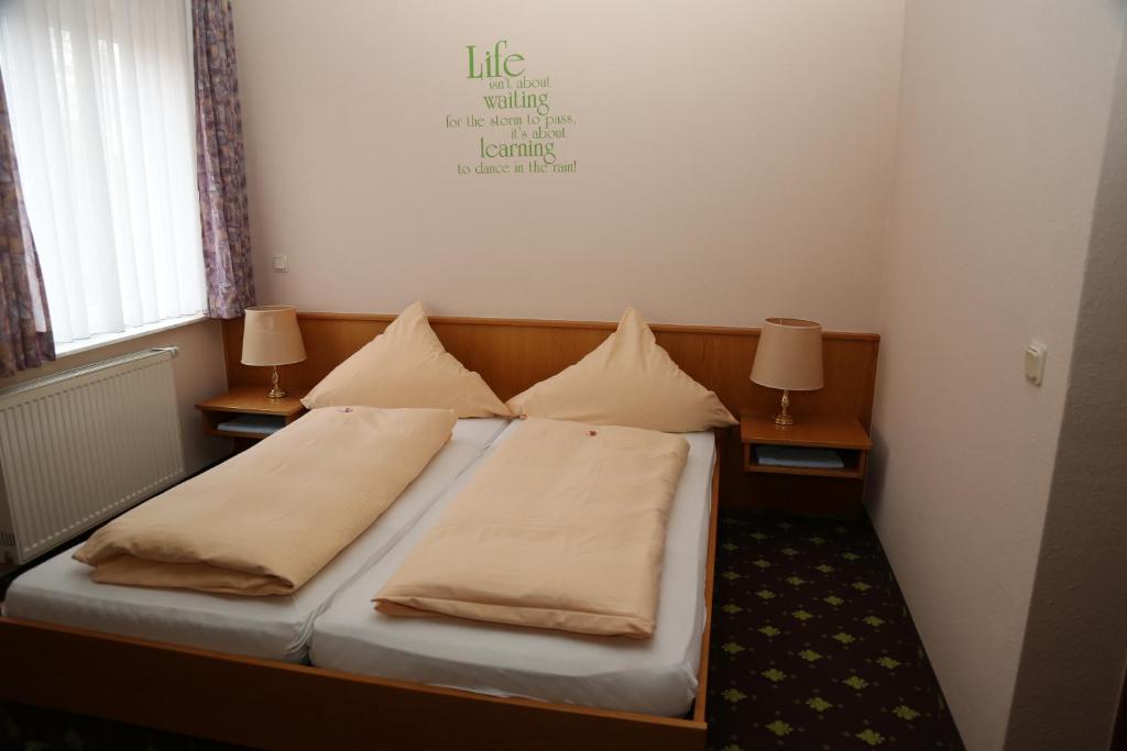 Postel nebo postele na pokoji v ubytování Hotel Taunus Residence