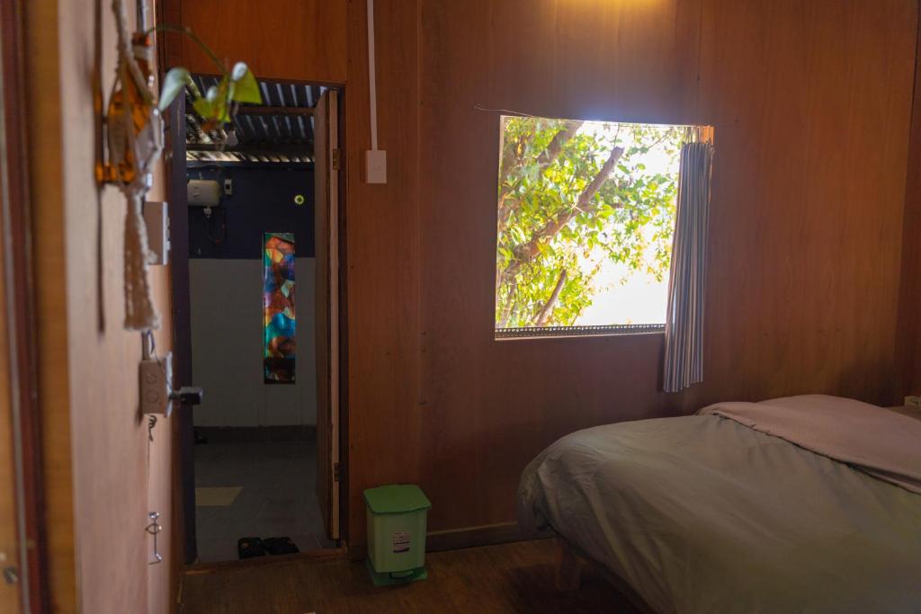 Postel nebo postele na pokoji v ubytování The Lake House Dalat