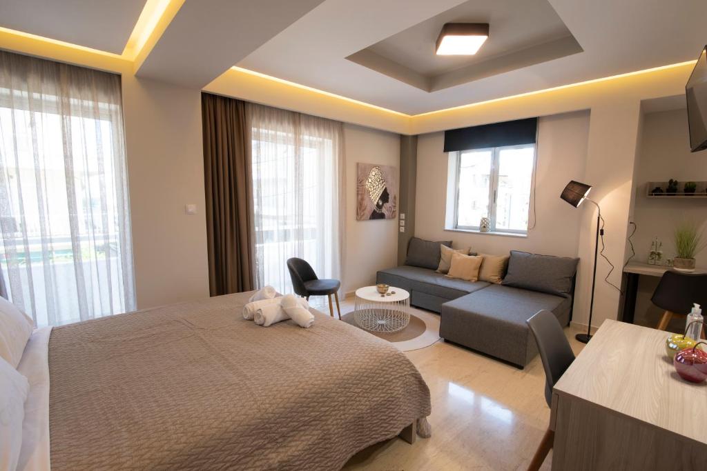 Łóżko lub łóżka w pokoju w obiekcie Αqua Dream Beach Apartment