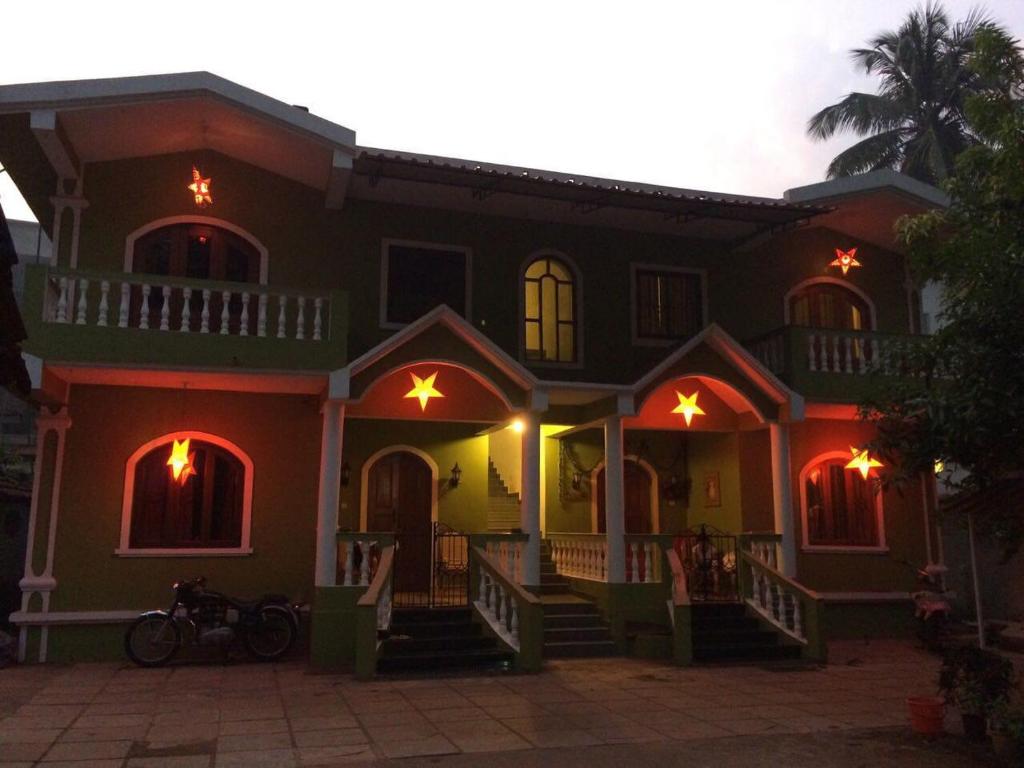 a house with lights on the front of it at Peter’s vacation rentals Goa in Calangute