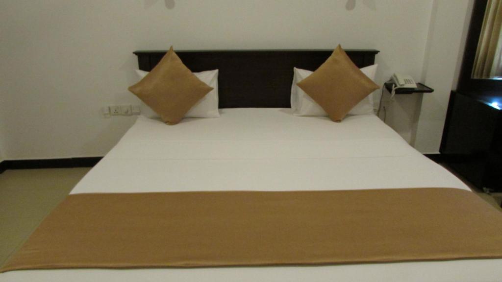 Voodi või voodid majutusasutuse Hotel Digana toas