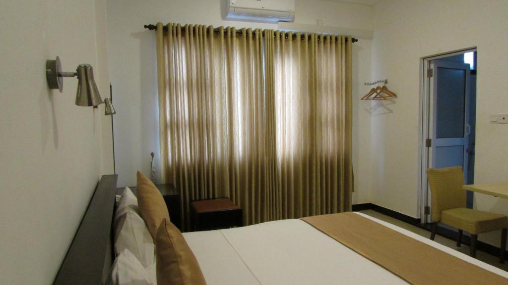 Voodi või voodid majutusasutuse Hotel Digana toas