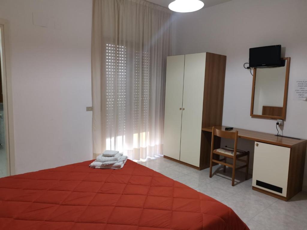 Postel nebo postele na pokoji v ubytování Hotel Park Grumentum