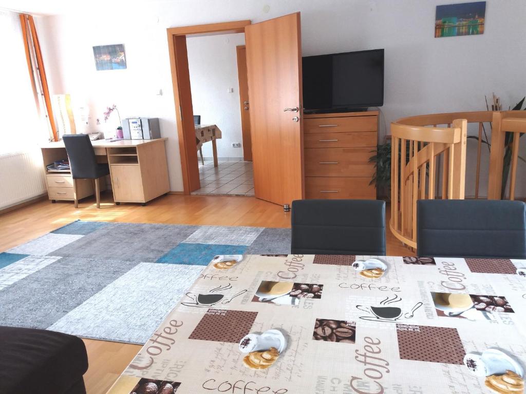 A television and/or entertainment centre at Linz Apartment Comfort-Size