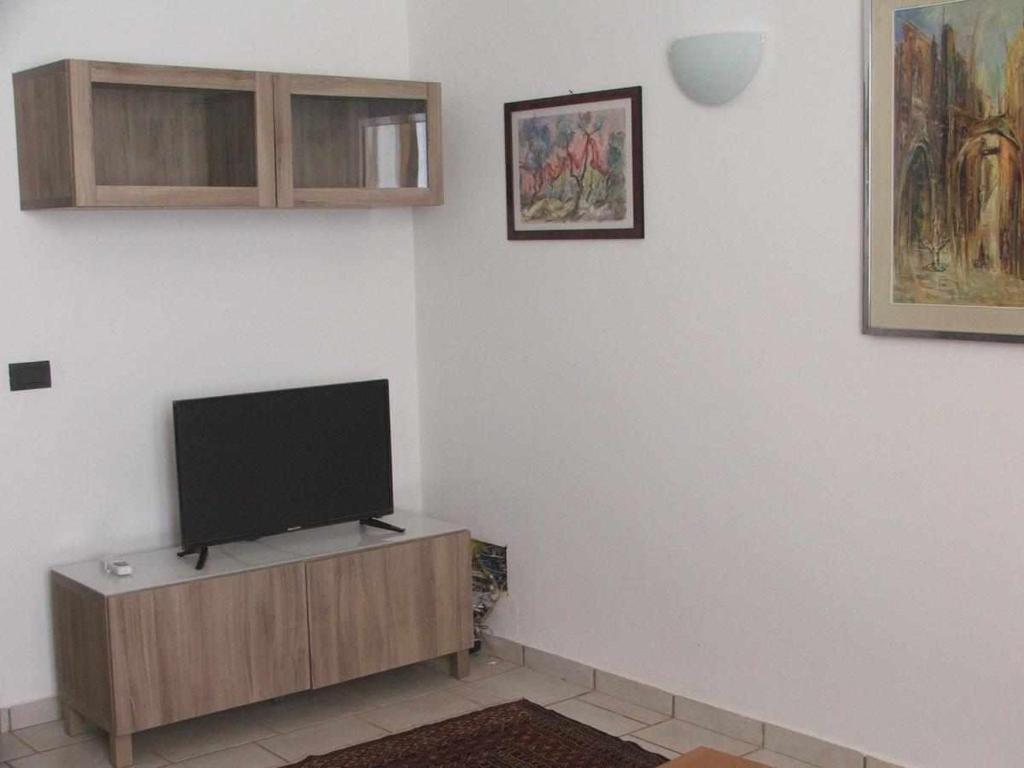 Telewizja i/lub zestaw kina domowego w obiekcie La casetta di Sofia
