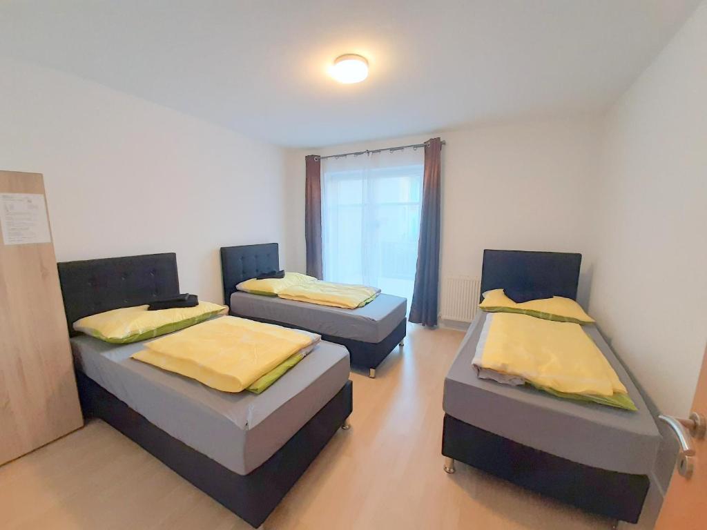 Posteľ alebo postele v izbe v ubytovaní Apartments SteelCity