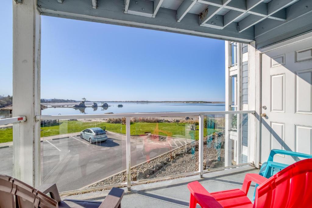 a balcony with a view of a parking lot at Birds Nest Suite in Lincoln City
