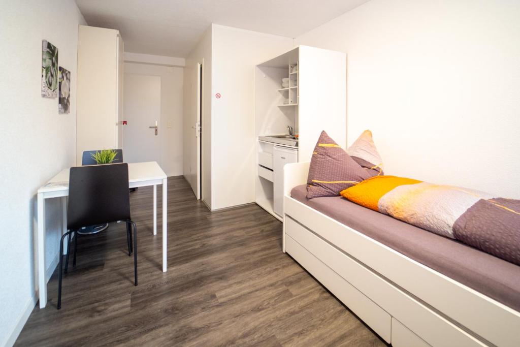 TV a/nebo společenská místnost v ubytování Anstatthotel Zug - self-check-in