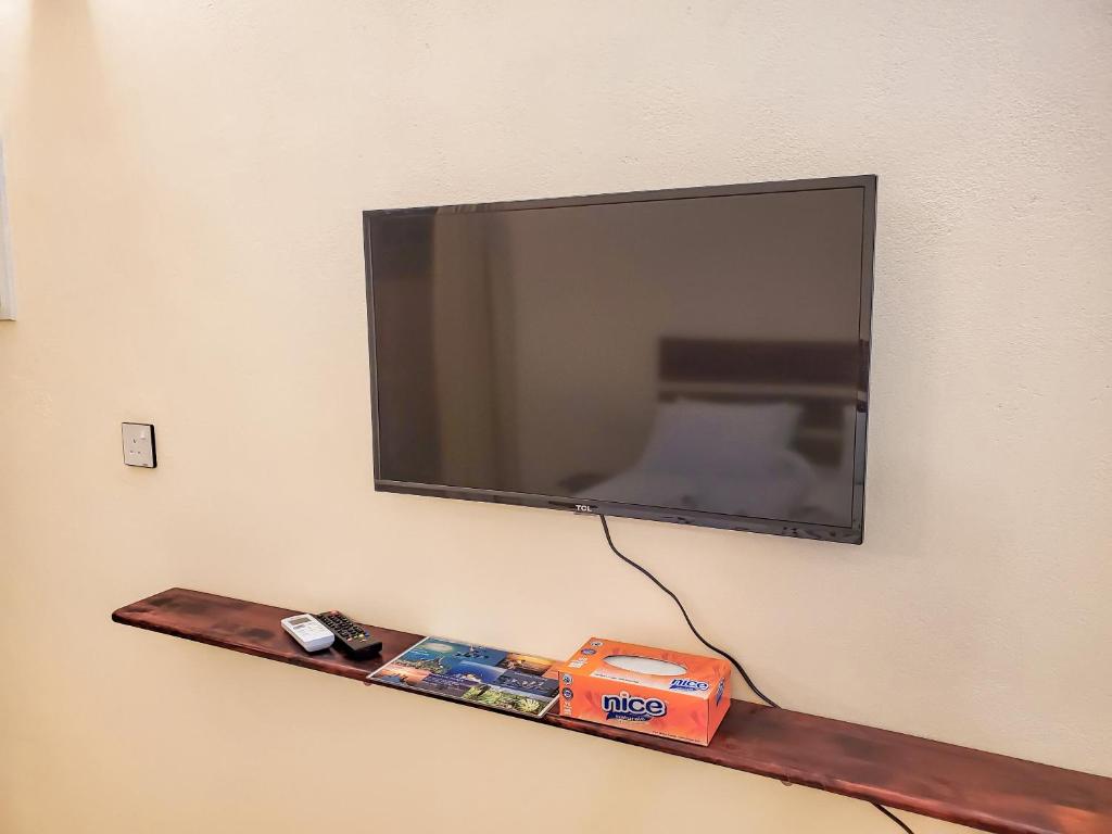 TV a/nebo společenská místnost v ubytování Shoreline Grand