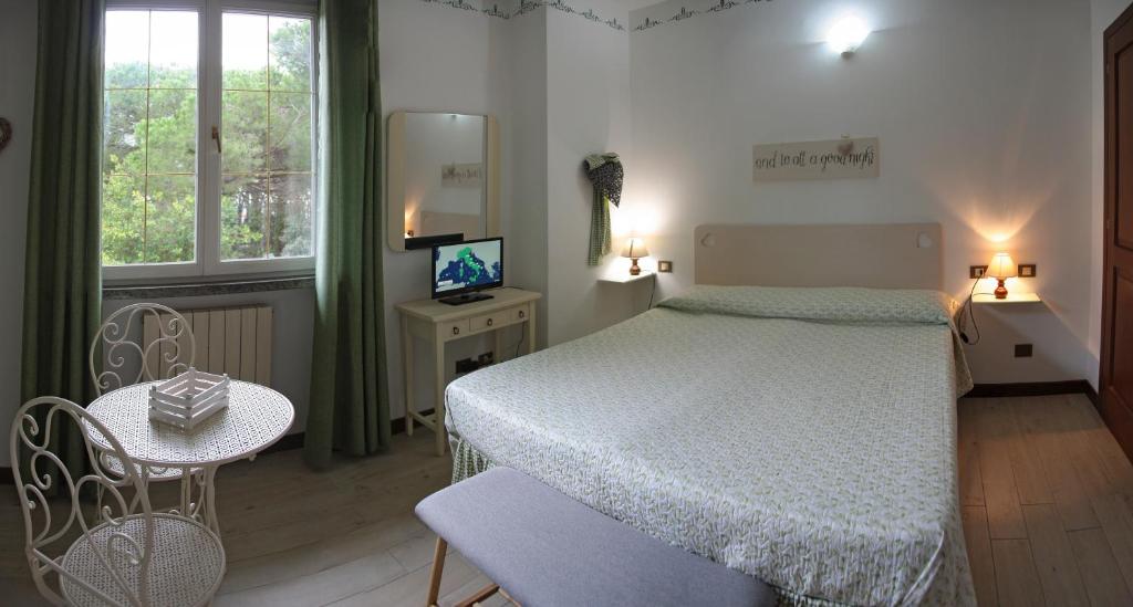 Posteľ alebo postele v izbe v ubytovaní Casa Margherita Affittacamere B&B