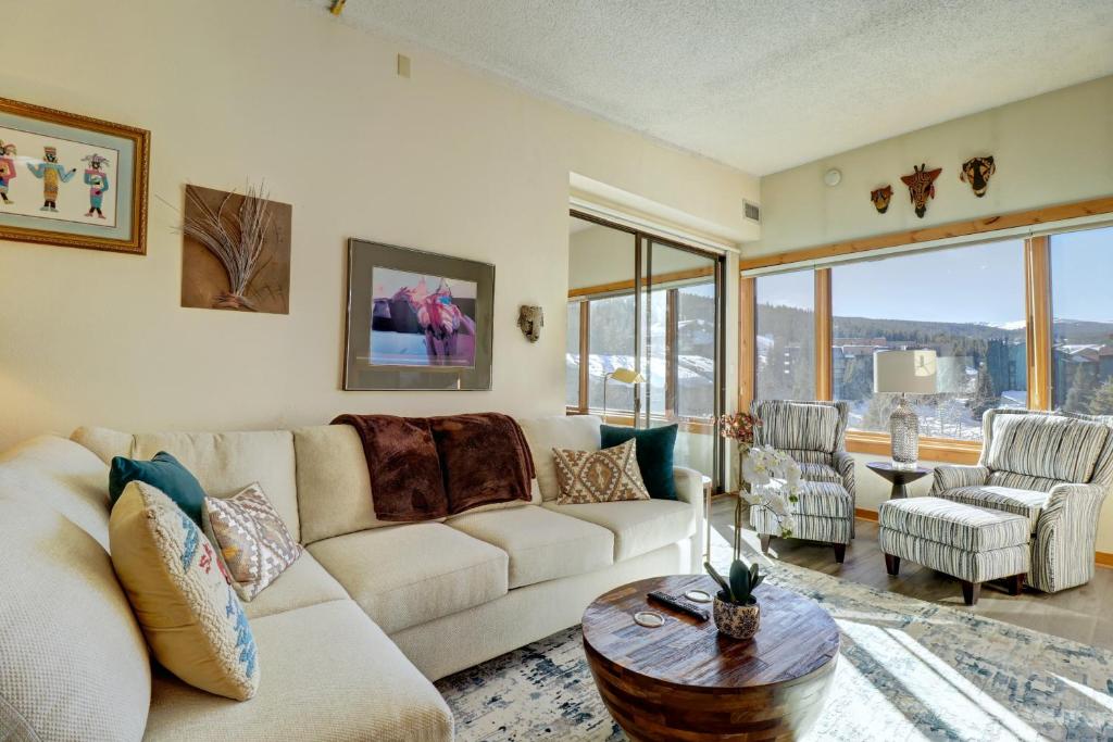 a living room with a couch and a table at Sh504 Summit House Condo in Copper Mountain