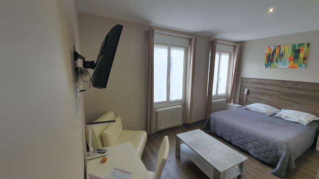 Postel nebo postele na pokoji v ubytování hotel des 2 nations