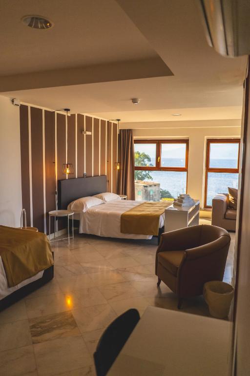 Postel nebo postele na pokoji v ubytování Hotel Continental
