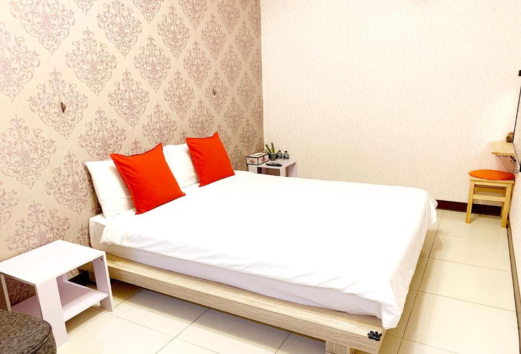 Postel nebo postele na pokoji v ubytování SNUG·NINE Hotel