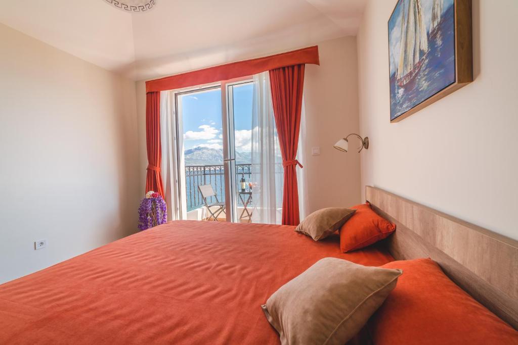 Postel nebo postele na pokoji v ubytování Villas Valentina