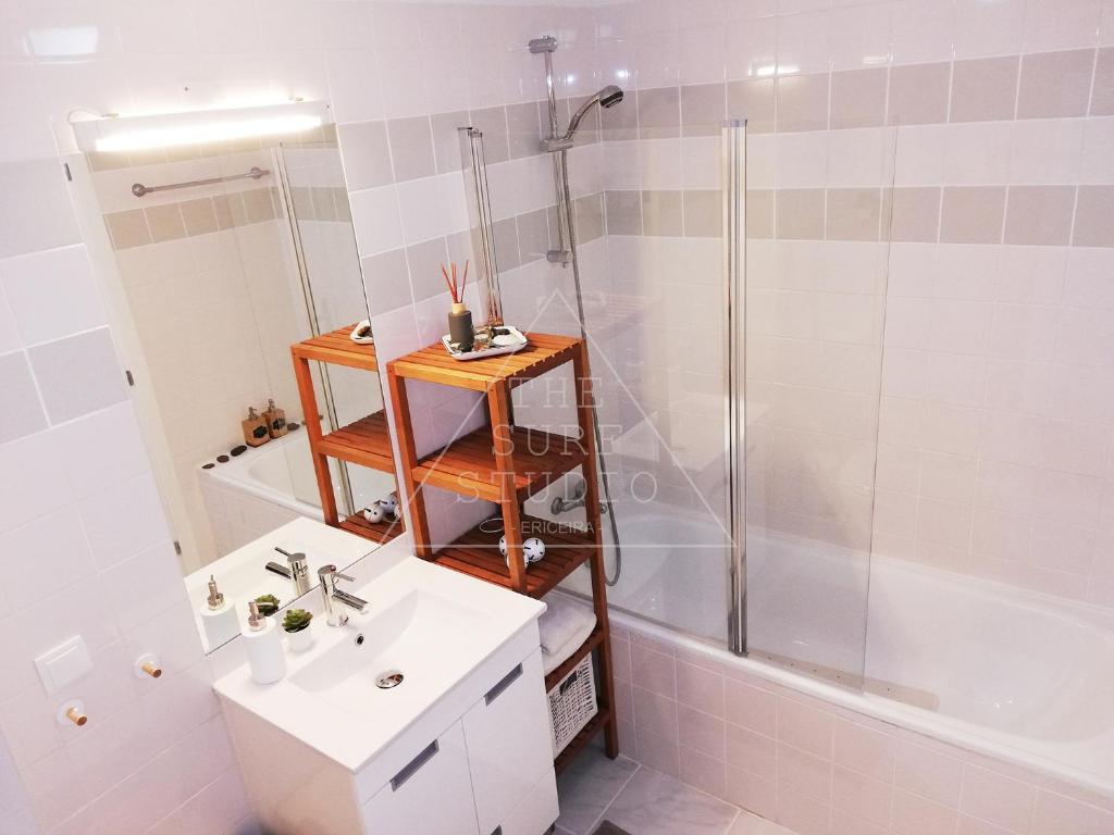 a bathroom with a shower and a sink and a toilet at The Surf Studio - Ericeira in Ericeira