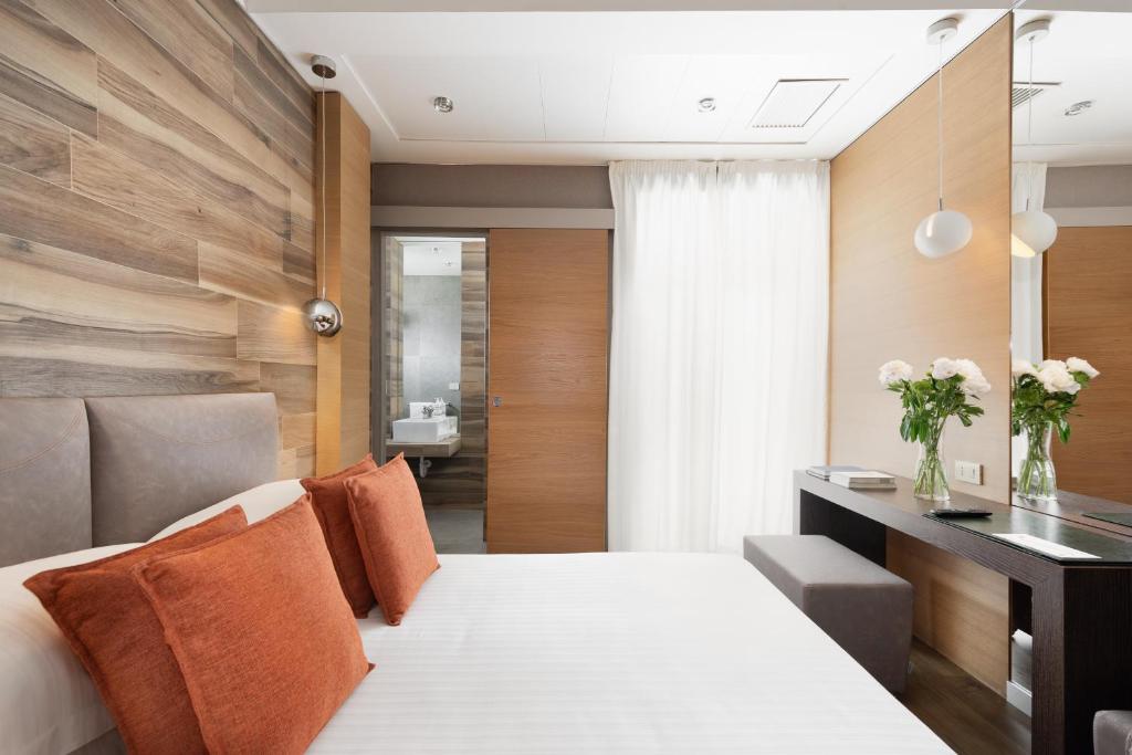 A bed or beds in a room at Bio Boutique Hotel XU' - Gruppo Ambienthotels