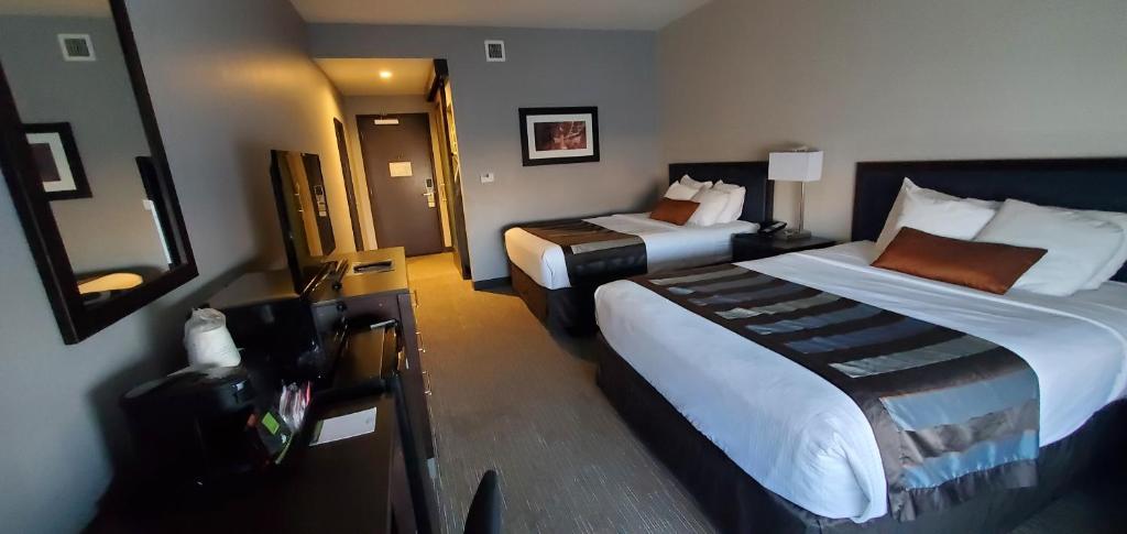 Ein Bett oder Betten in einem Zimmer der Unterkunft Wingate by Wyndham Page Lake Powell