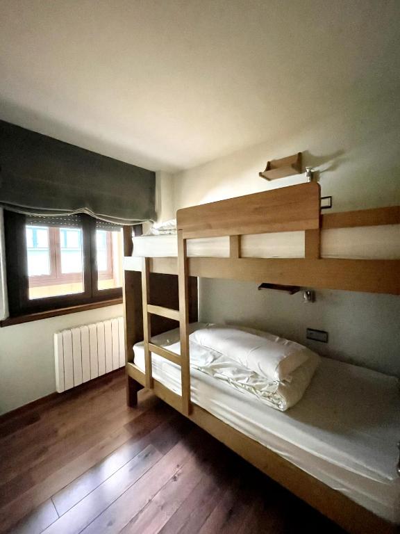 Cama o camas de una habitación en Apartaments Gran Vall