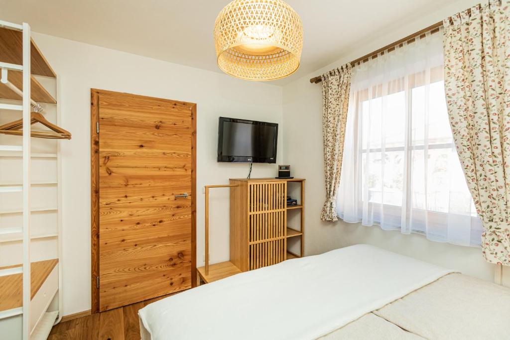 Posteľ alebo postele v izbe v ubytovaní Tonis Apartment