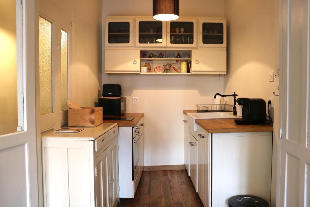 Kuchyň nebo kuchyňský kout v ubytování Appartement Barcelonnette centre