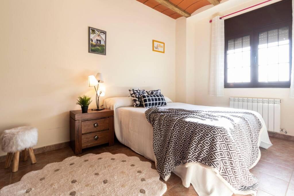 A bed or beds in a room at Lo Guaret.