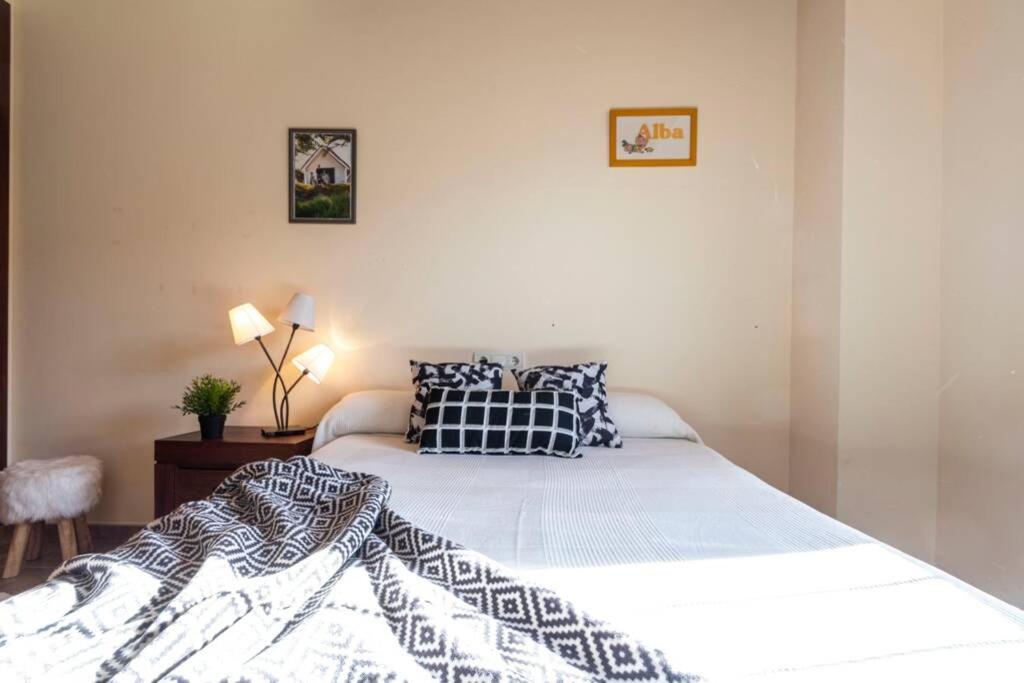 A bed or beds in a room at Lo Guaret.