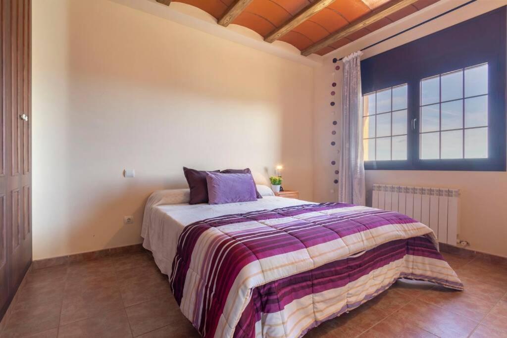 A bed or beds in a room at Lo Guaret.