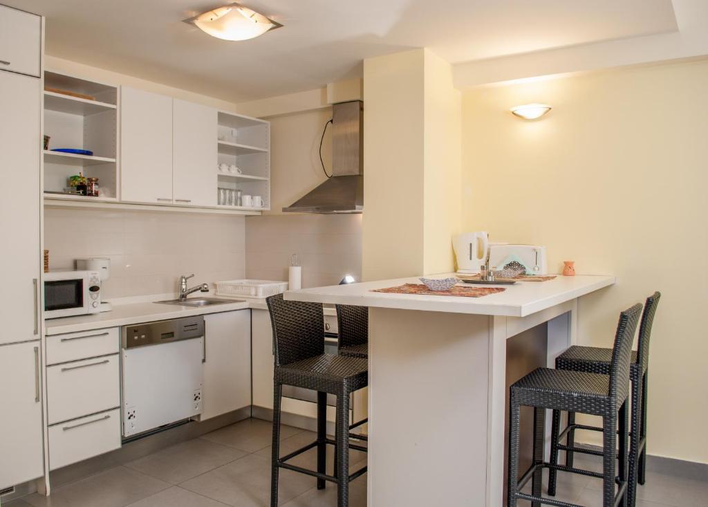 Kuchyňa alebo kuchynka v ubytovaní Luxury Downtown Apartments