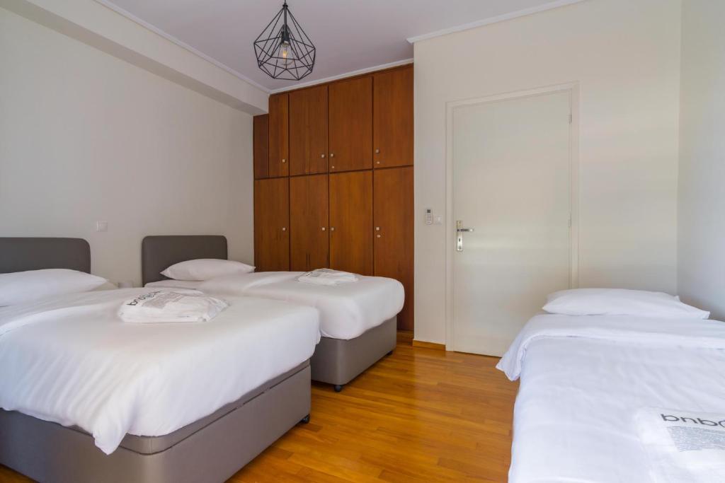 Postel nebo postele na pokoji v ubytování Two Bedroom Apartment in Chalandri with Balcony