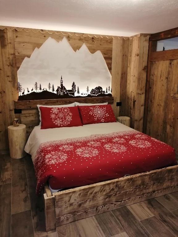 Łóżko lub łóżka w pokoju w obiekcie Maison Perriail Vda Gressan n 0029