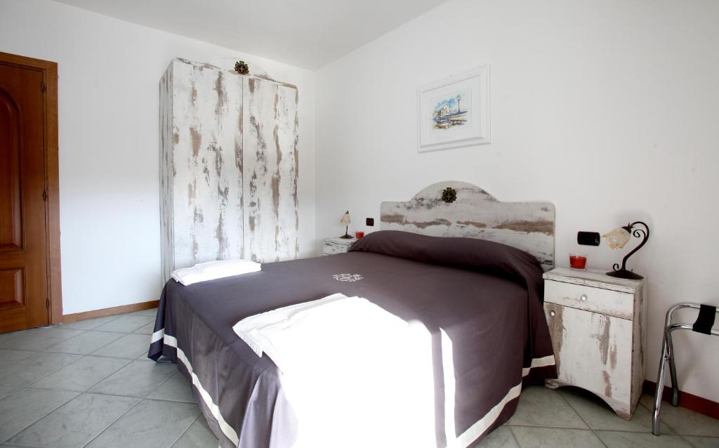 Postel nebo postele na pokoji v ubytování Luxury Room Vittorio Emanuele II