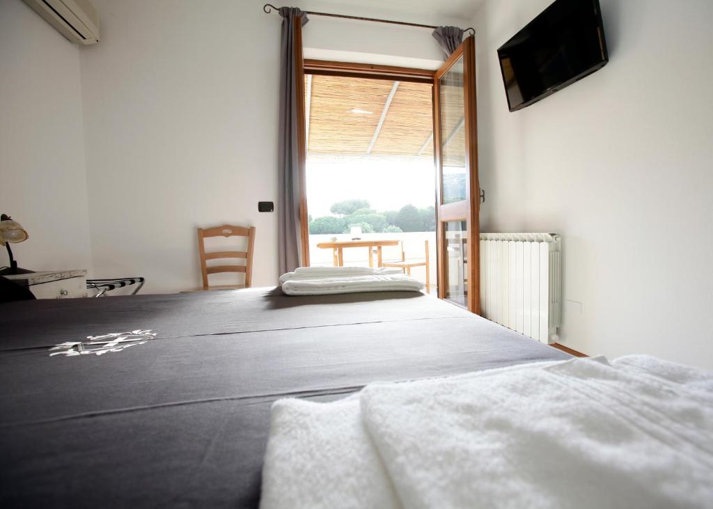 Postel nebo postele na pokoji v ubytování Luxury Room Vittorio Emanuele II