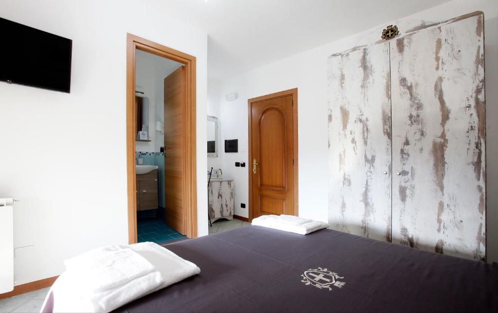 Postel nebo postele na pokoji v ubytování Luxury Room Vittorio Emanuele II