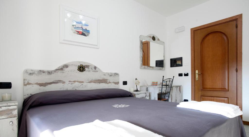 Postel nebo postele na pokoji v ubytování Luxury Room Vittorio Emanuele II
