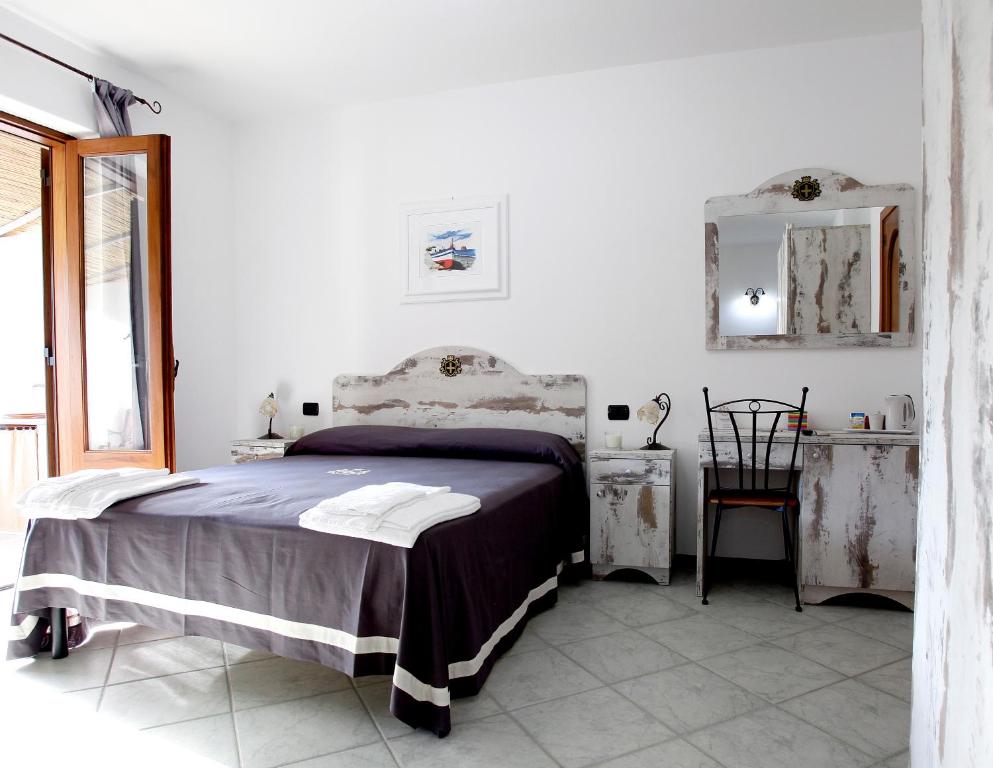 Postel nebo postele na pokoji v ubytování Luxury Room Vittorio Emanuele II