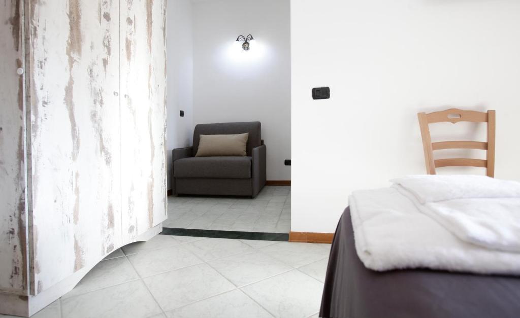Postel nebo postele na pokoji v ubytování Luxury Room Vittorio Emanuele II