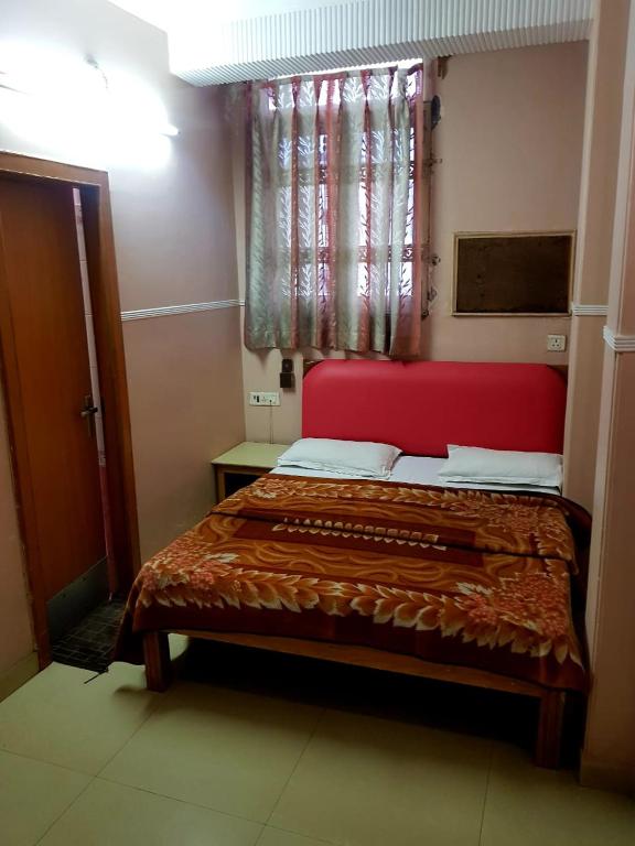 Postel nebo postele na pokoji v ubytování Hotel Queen