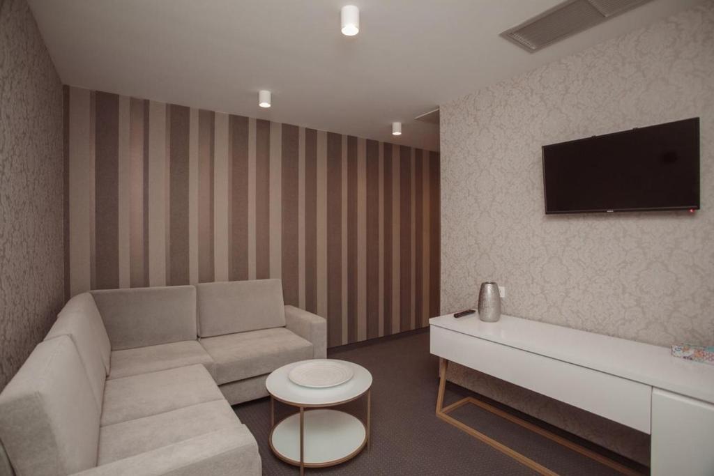 TV a/nebo společenská místnost v ubytování Hotel Chicago