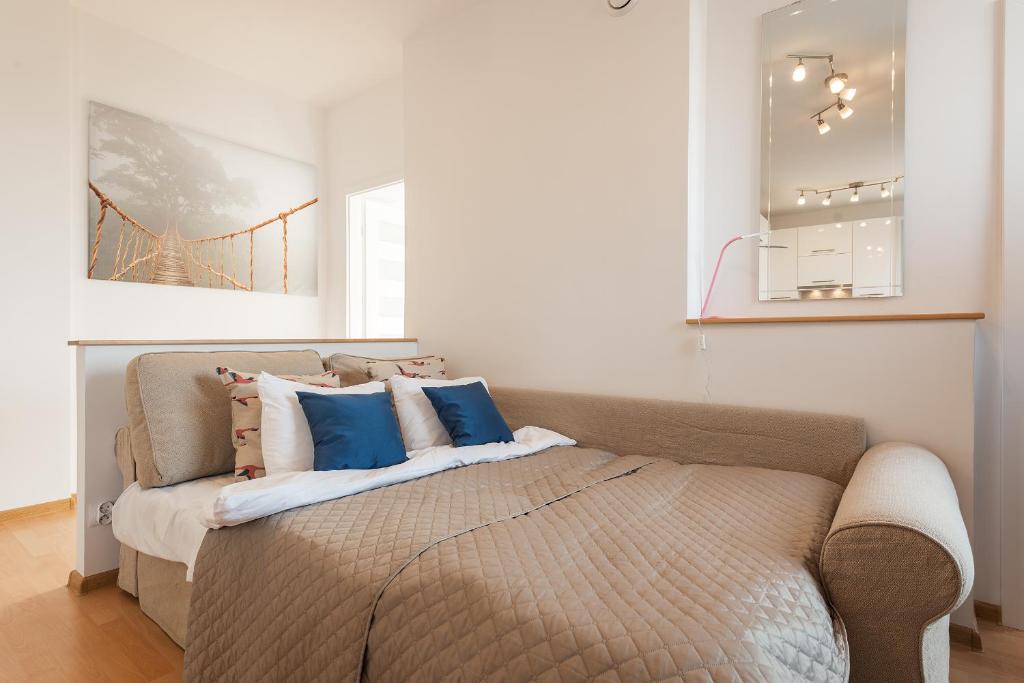 Posteľ alebo postele v izbe v ubytovaní Szczesliwice Ochota P&O Serviced Apartments