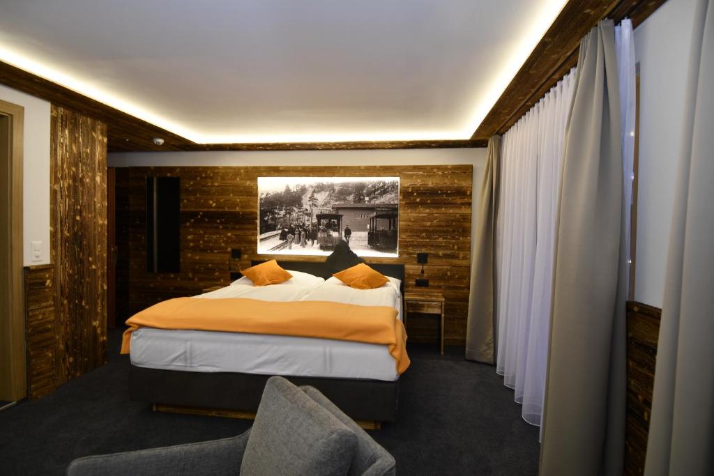 Postel nebo postele na pokoji v ubytování Hotel Elite