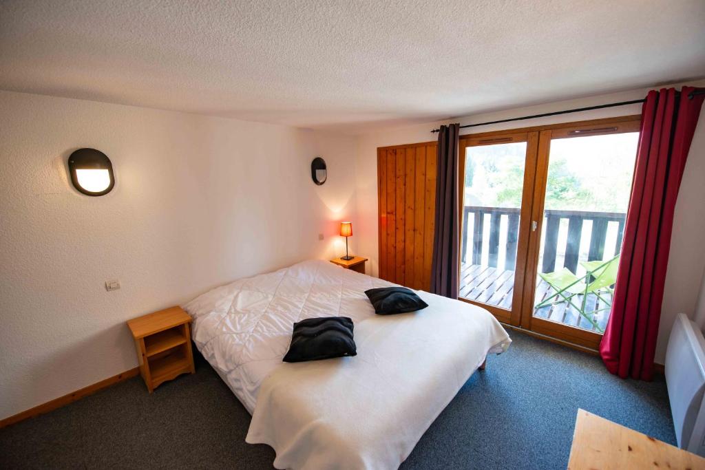 Postel nebo postele na pokoji v ubytování SUNWEB - Timberlodge